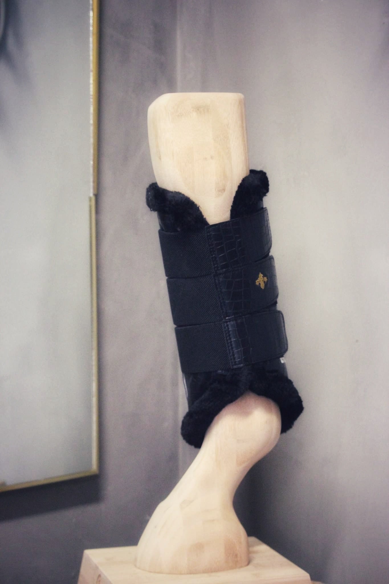 Onyx leg protectors in black faux crocko leather with mink fleece padding and three elastic velcro straps.