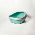 Example product mint green plastic cat litter box with white rim on white background
