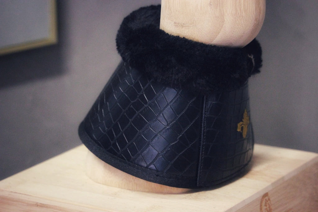 Onyx Bell boots in faux croc leather with black mink fleece padding and gold embroidered Lily logo, set of two