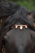 Rosegold raindrop browband with large crystals on black horse, leather strap with embossed logo, elegant equestrian accessory