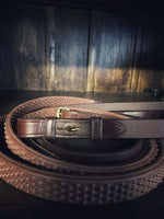 Load image into Gallery viewer, Black rubber reins with brass details and Italian leather accents
